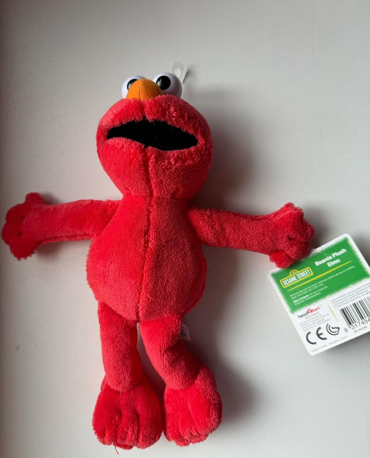 Small Elmo plush toy